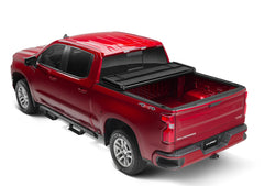 Lund 04-14 Chevy Colorado Styleside (6ft. Bed) Hard Fold Tonneau Cover - Black