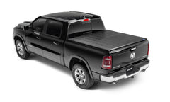 Lund 05-12 Dodge Dakota (6.5ft. Bed w/o Utility TRack) Genesis Tri-Fold Tonneau Cover - Black