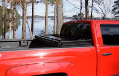 Lund 09-14 Ford F-150 Styleside (8ft. Bed) Hard Fold Tonneau Cover - Black