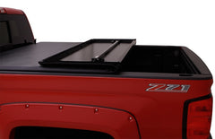 Lund 05-15 Toyota Tacoma Fleetside (5ft. Bed) Hard Fold Tonneau Cover - Black